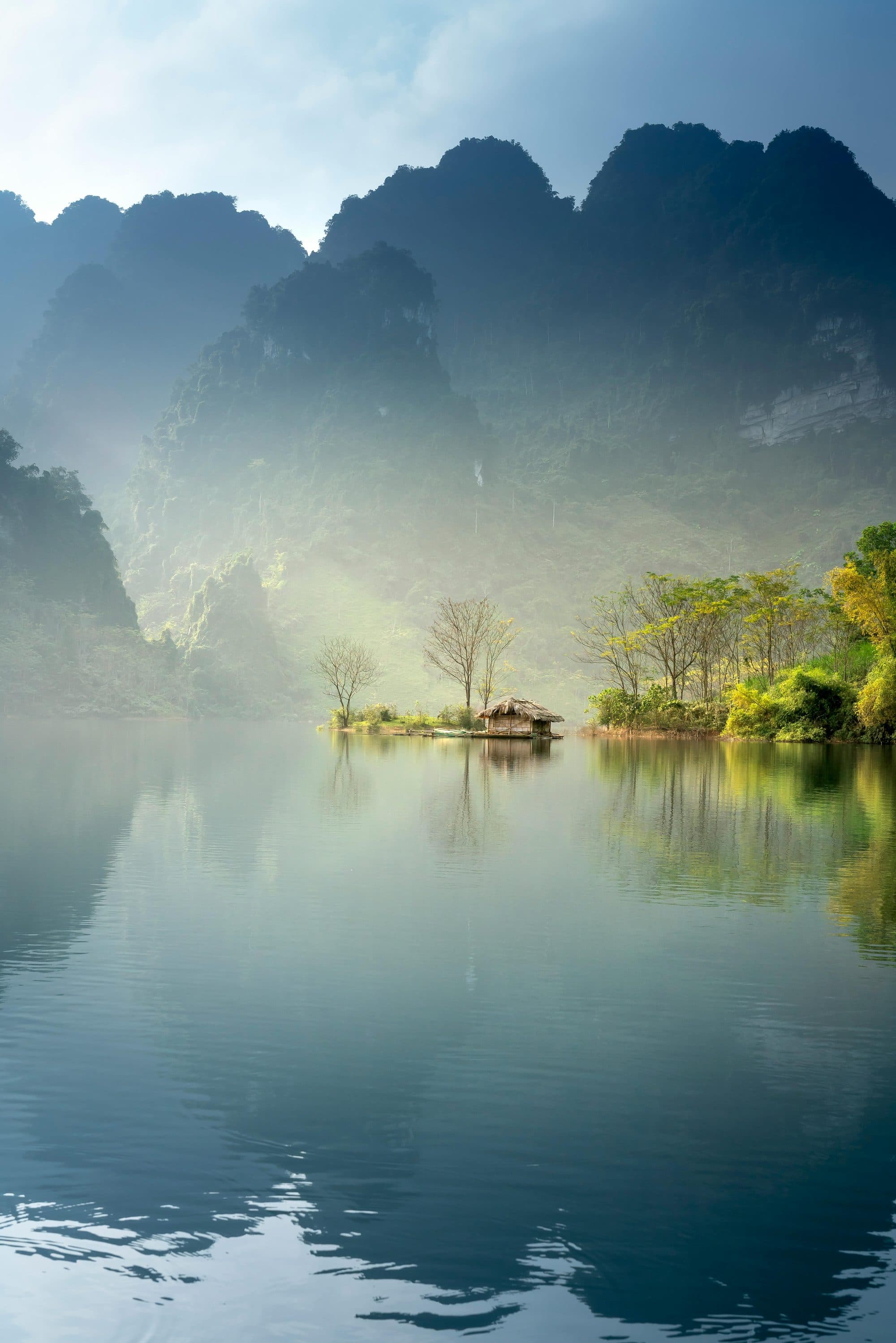 Still misty lake among mountains