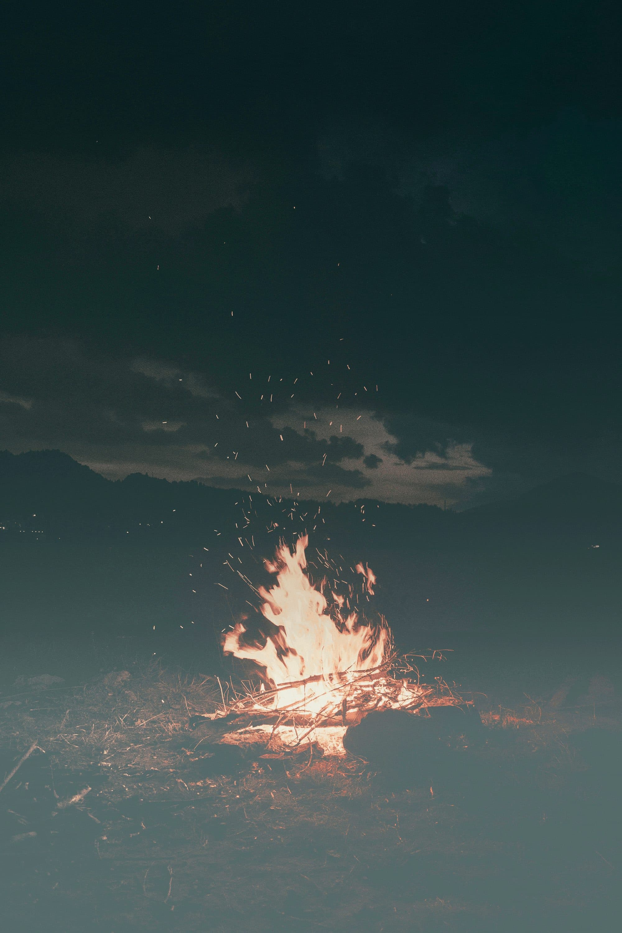 Firelight against the night sky