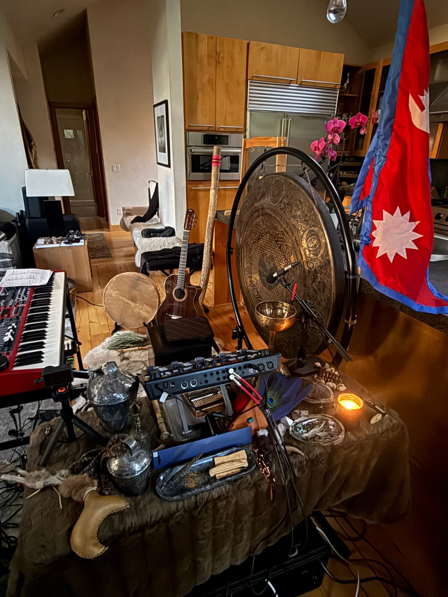 Altar table, gong, and the Nepal flag