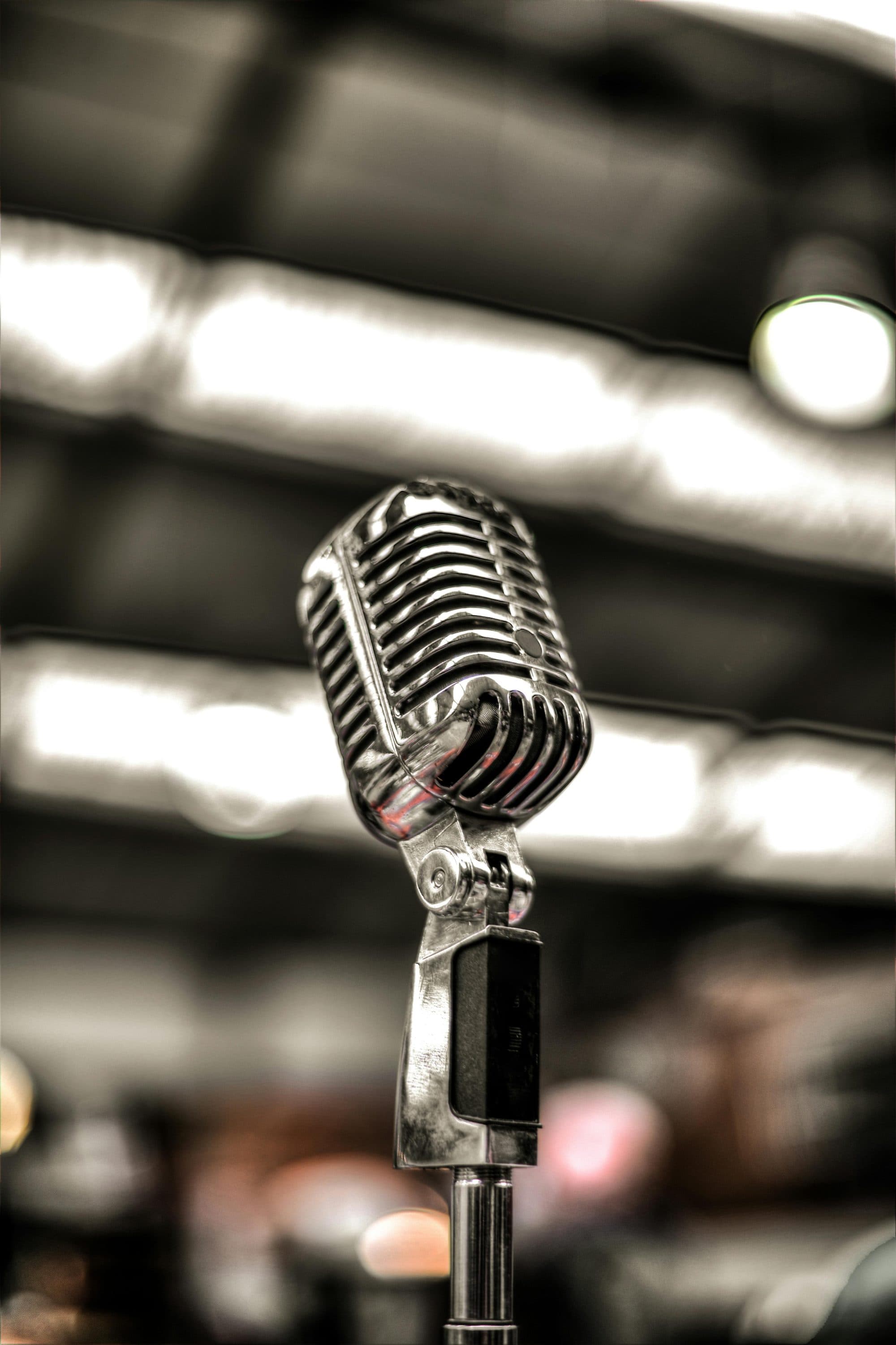 A vintage microphone in low light
